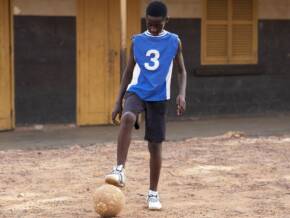 full-shot-kid-playing-with-ball full-shot-kid-playing-with-ball